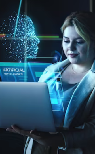 A woman stands in dim lighting, holding a laptop. A digital face and 'Artificial Intelligence' text hover above the screen, conveying a futuristic tech theme.